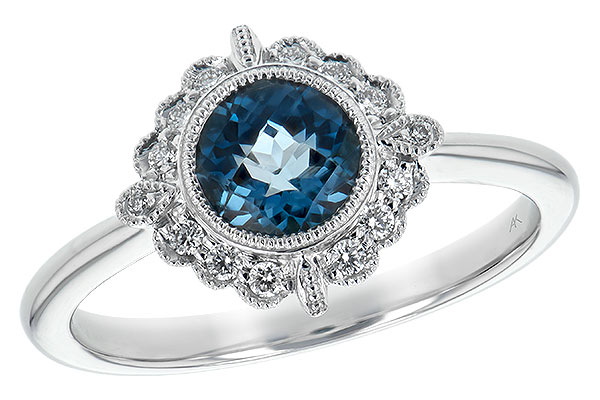 L243-65034: LDS RG .93 BLUE TOPAZ 1.05 TGW